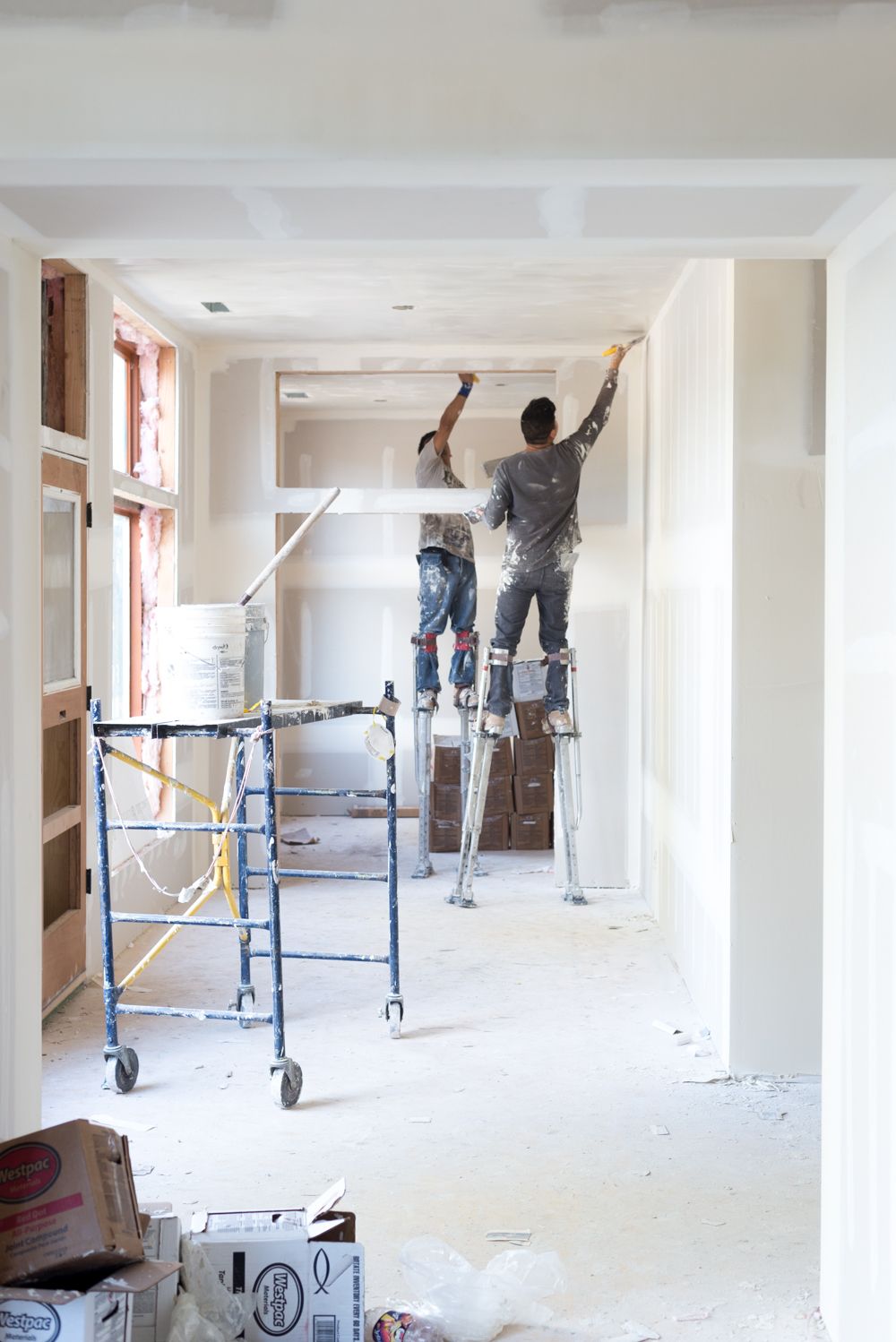 Équipe plâtriers chantier
